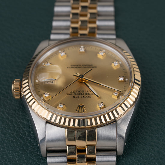 Rolex Datejust 16013 Champagne Diamanten Dial - ondersteboven aanzicht van de wijzerplaat, kroon links
