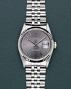Rolex Datejust 16234 Gray Dial - frontaal aanzicht met grijze wijzerplaat en witgouden fluted bezel