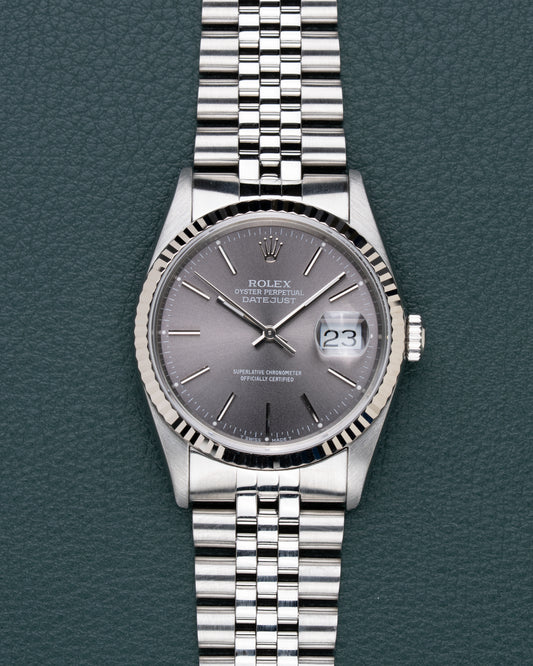 Rolex Datejust 16234 Gray Dial - frontaal aanzicht met grijze wijzerplaat en witgouden fluted bezel