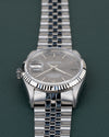 Rolex Datejust 16234 Gray Dial - close-up van wijzerplaat en fluted bezel met kroon